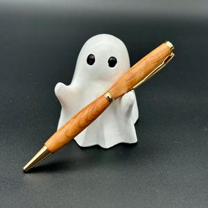 Handgemaakte slanke pen van Grieks olijfhout