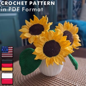May include: Crochet sunflowers in a white vase. The sunflowers have yellow petals and dark brown centers. A green leaf is visible. The text "CROCHET PATTERN in PDF Format" is at the top of the image.