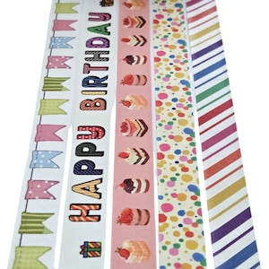 May include: A collection of decorative washi tapes with various designs. One tape features the words "HAPPY BIRTHDAY" in colorful letters. Other tapes display pennants, cake illustrations, polka dots, and diagonal stripes. These tapes are ideal for crafting and scrapbooking.