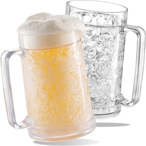 May include: Two clear glass beer mugs with handles. One mug is filled with a light yellow beer with a white head of foam. The other mug is filled with ice.