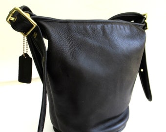 vintage coach black leather maggie bucket  bag   ...  classic crossbody duffle sac feed bag   ...   made in the United States