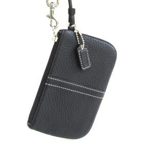 vintage coach black pebbled  leather  zip wristlet  ...   classic leather wallet  ...  compact carry all
