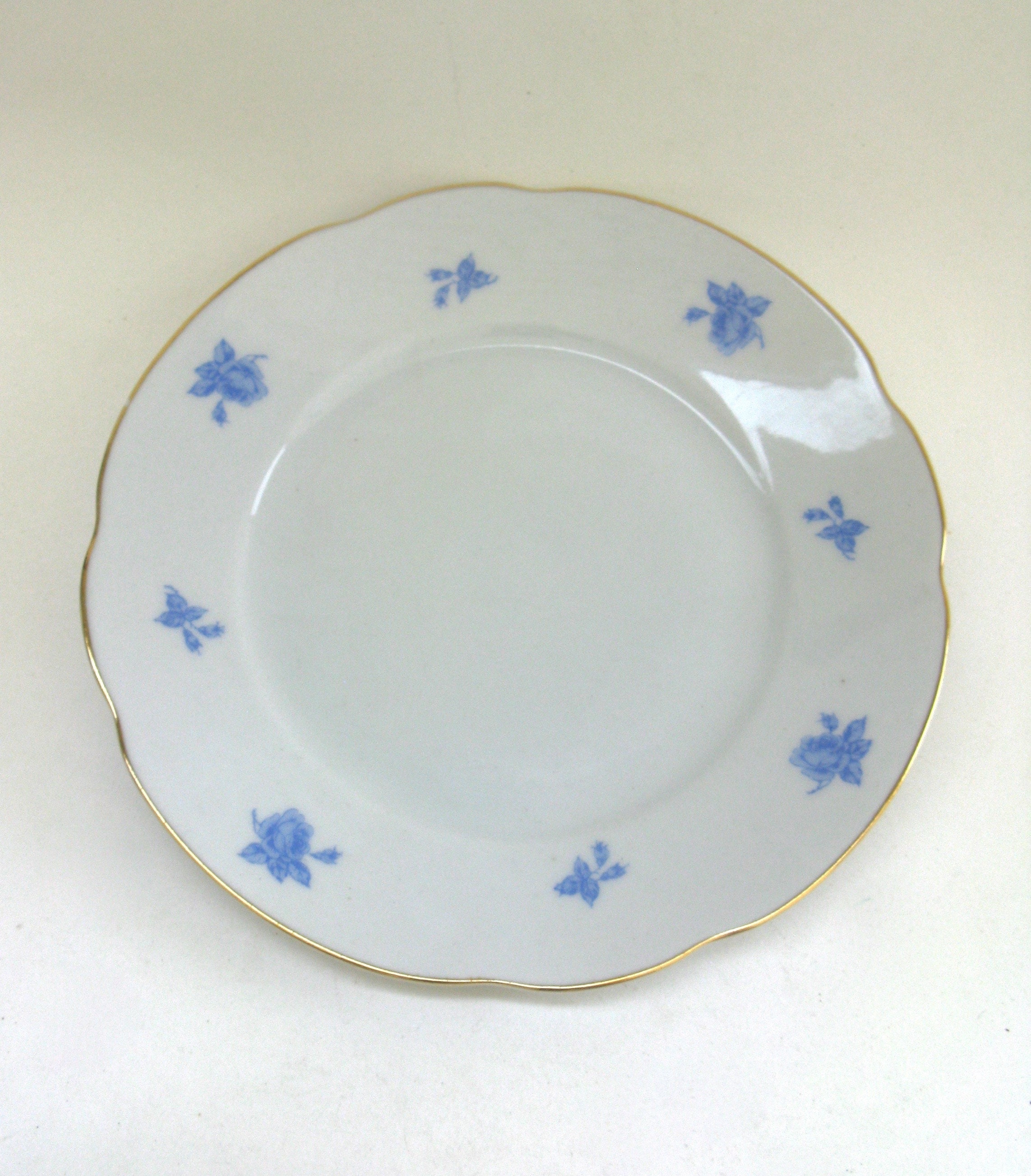Vintage ARABIA Blue Rose . White Porcelain Cup Saucer and