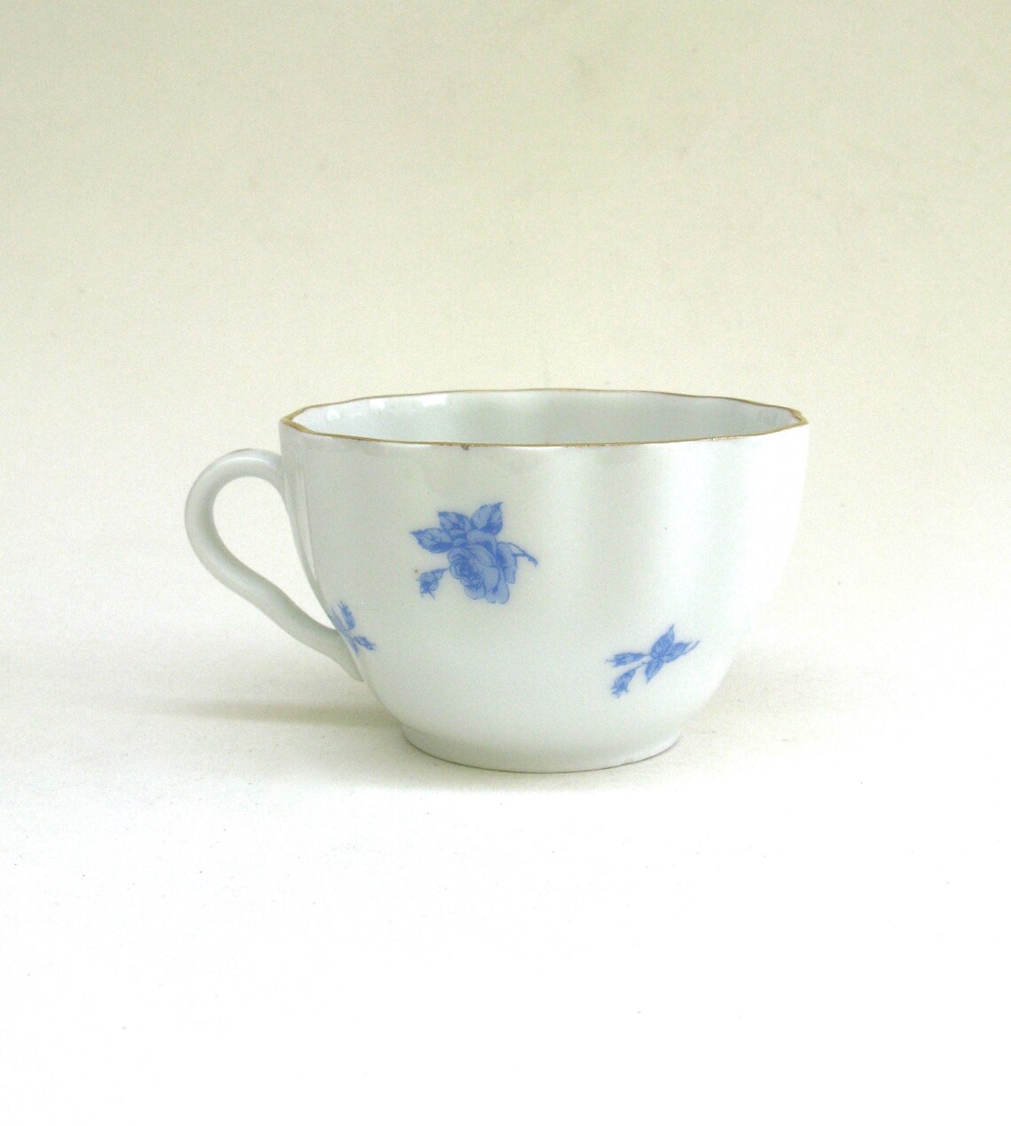 Vintage ARABIA Blue Rose . White Porcelain Cup Saucer and