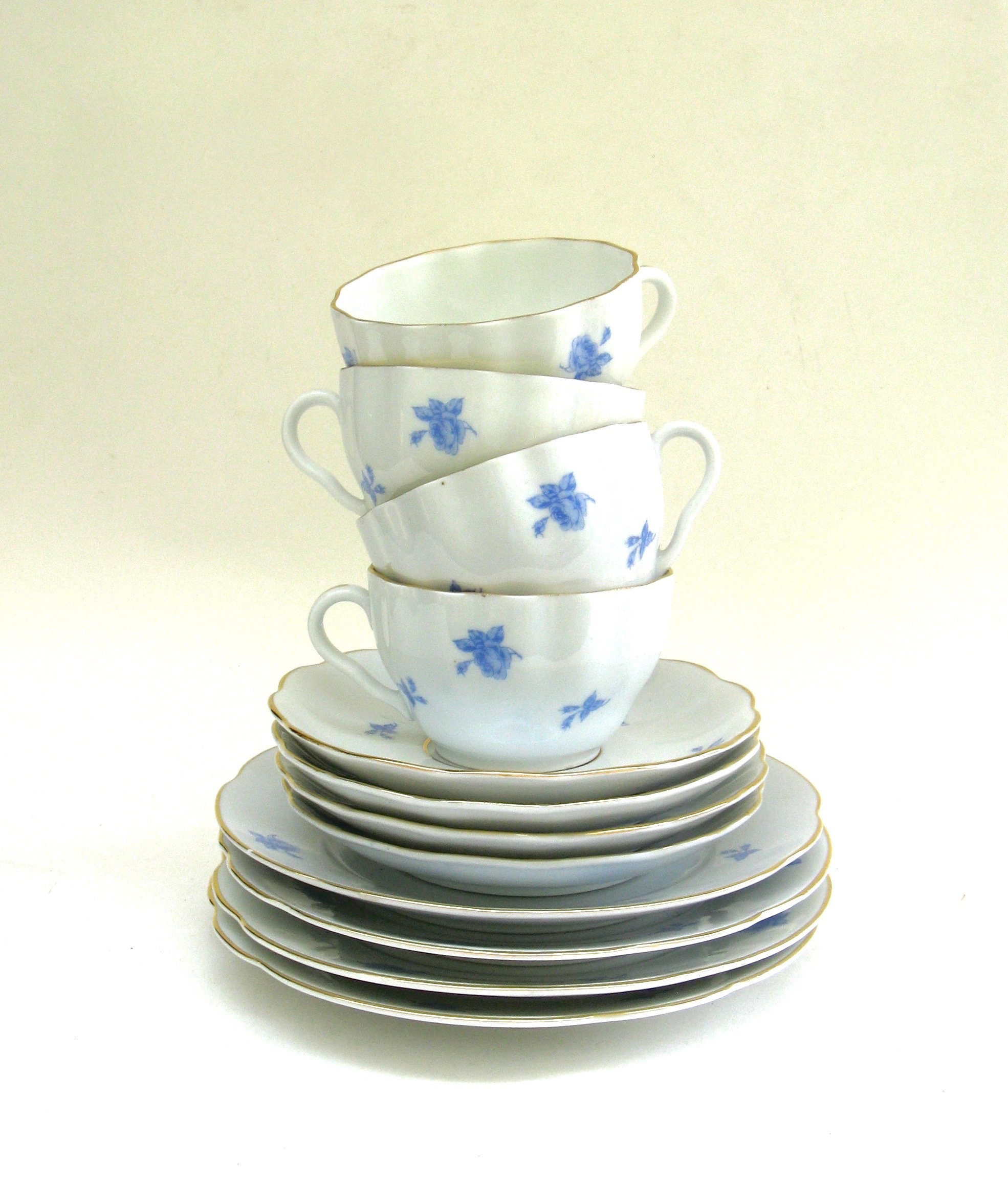 Vintage ARABIA Blue Rose . White Porcelain Cup Saucer and