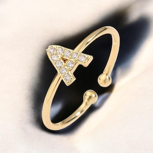 Anillo con inicial de circonita cúbica y alfabeto ajustable para pareja, joyería clásica dorada para mujer y hombre.