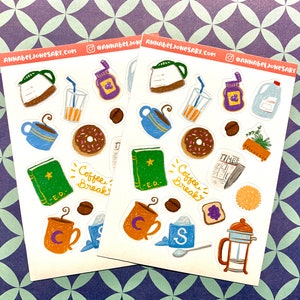 May include: Two sheets of stickers with a coffee break theme. The stickers feature illustrations of coffee mugs, donuts, books, a coffee pot, a french press, a newspaper, a plant, and a jar of jam. The text "Coffee Break" is written on both sheets.