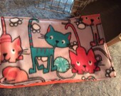 Fleece Crate Mat  in Multi Colored Cats with Yarn