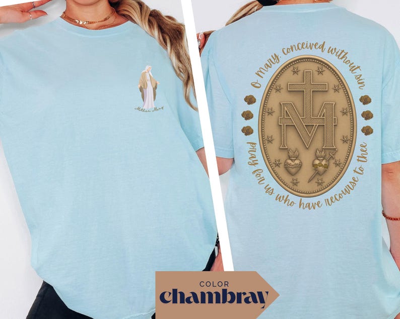 May include: Light blue t-shirt with a graphic on the front of a religious figure and the words "Mother Mary". The back of the shirt features a gold emblem with a cross, the letters "M" and "V", and the words "O Mary conceived without sin, pray for us who have recourse to thee."