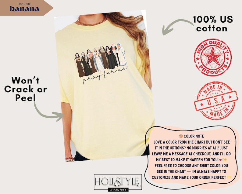 May include: A light yellow t-shirt with a graphic of several figures and the text "pray for us." The shirt is made of 100% US cotton and features the text "Won't Crack or Peel." The shirt is from Hollstyle Urban Shop.