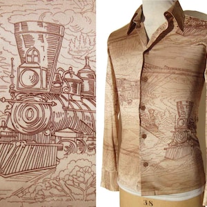 May include: Tan button-down shirt with a brown train pattern. The long-sleeved shirt features a detailed illustration of a vintage steam train, railroad tracks, and a landscape design. The shirt is displayed on a mannequin.