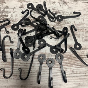 Horseshoe Nail Hook 2 3/8” long hand forged blacksmith hook cast iron hook
