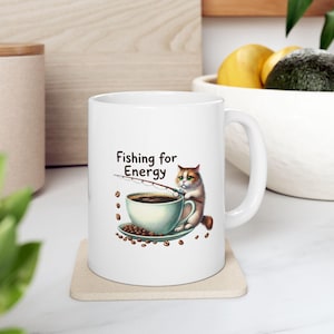 Funny "Fishing for Energy" Cat Coffee Mug | Adorable Cat and Coffee Beans Design | BPA-Free Ceramic