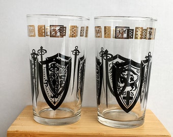 Vintage MCM Drinking Glasses Pair Shield Crest Coat of Arms Gold Black Sword Eagle Phoenix Snake Horse 1950s Mid Century Heraldic Medieval.