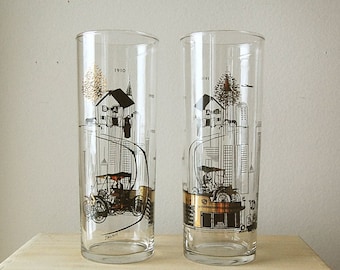 Pair of Vintage Drinking Glasses Mid Century Modern Gold and Black Tall Cocktail Barware with Transportation Theme.