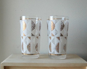 Vintage Pair of Mid Century Modern Drinking Glasses with Gold and White Design.