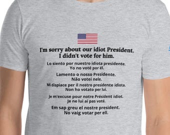 Original Sorry about our idiot President tee 6 language I didn't vote for him world travel American apology t shirt multilingual anti Trump