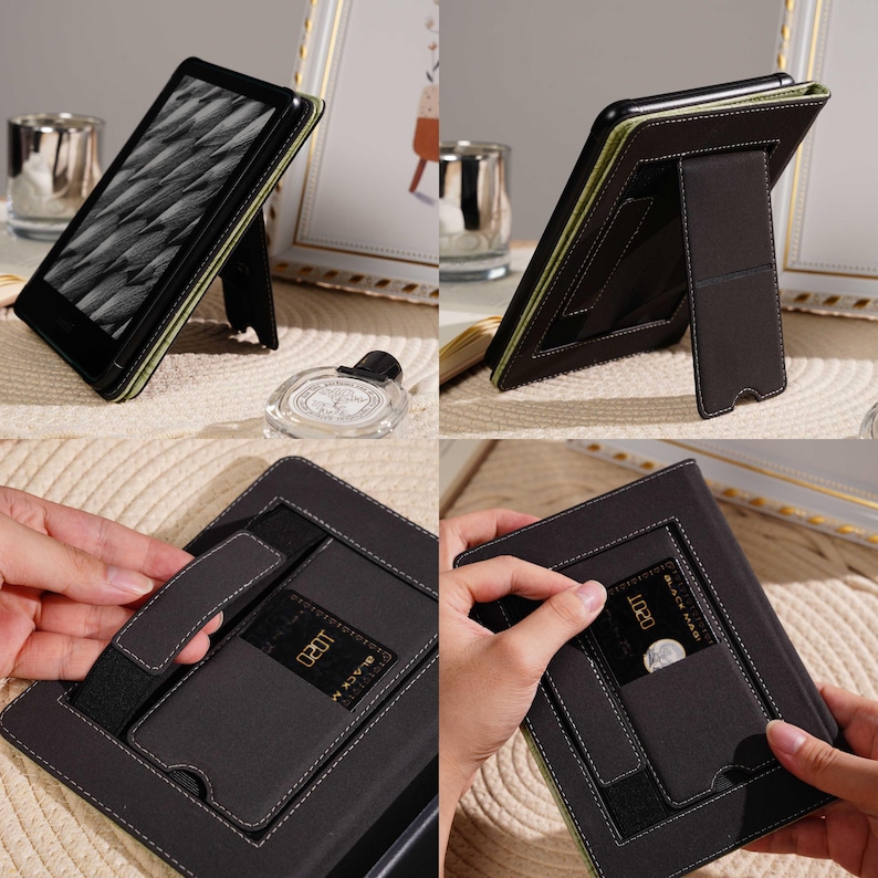 May include: Black e-reader case with a built-in stand. The case is dark gray with white stitching and a green interior. It features a card slot and a hand strap for secure handling. The e-reader displays a black and white pattern.