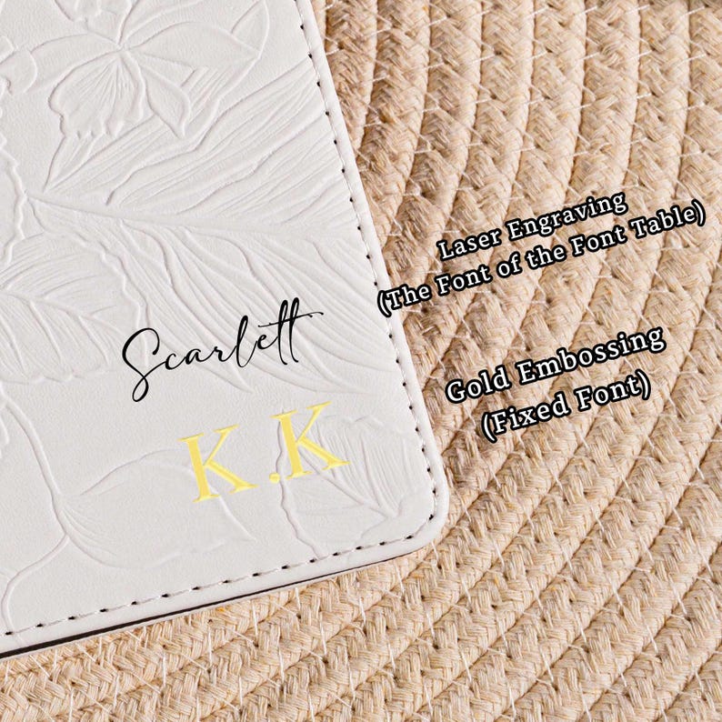 May include: Close-up of a white leather item with embossed floral design. The name "Scarlett" is written in black script, with gold embossed initials "K.K." below. Text on the right indicates "Laser Engraving" and "Gold Embossing."