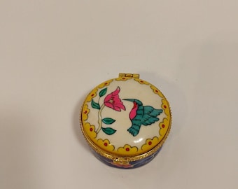 Vintage porcelain, hummingbird and floral design pillbox handpainted with...