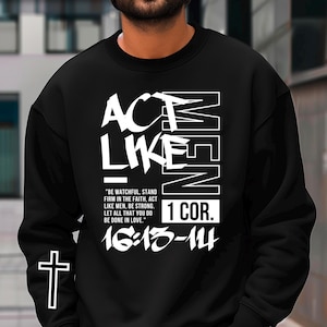 May include: Black sweatshirt with white text that reads "Act Like Men 1 Cor. 16:15-14" and a cross on the sleeve.