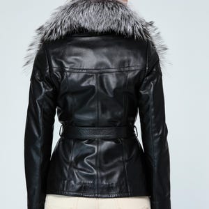 Elegant black peacoat jacket with soft fur collar and luxury tailoring


High-end women’s leather outerwear handmade in Istanbul atelier


Classic black leather winter trench coat with feminine fitted design


Luxury lambskin jacket with warm fur collar for winter fashion styling


Timeless women’s leather peacoat featuring premium craftsmanship and elegant details


Handmade Turkish leather coat for women with refined luxury winter aesthetic
