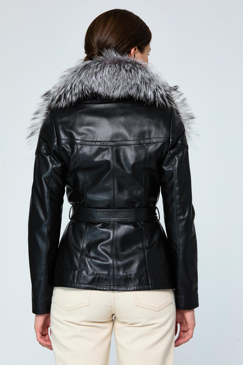 Elegant black peacoat jacket with soft fur collar and luxury tailoring


High-end women’s leather outerwear handmade in Istanbul atelier


Classic black leather winter trench coat with feminine fitted design


Luxury lambskin jacket with warm fur collar for winter fashion styling


Timeless women’s leather peacoat featuring premium craftsmanship and elegant details


Handmade Turkish leather coat for women with refined luxury winter aesthetic