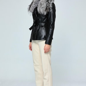 Women’s black leather coat with elegant fox fur collar and slim fit silhouette


Luxury Turkish lambskin peacoat jacket designed for sophisticated winter style


Handmade black genuine leather trench coat with detachable fur collar


Women’s slim fit winter leather coat crafted from premium Turkish lambskin