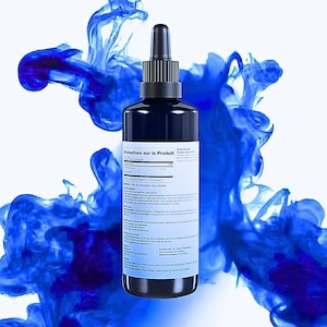 May include: A dark blue bottle with a black dropper, set against a backdrop of swirling blue ink. The bottle has a white label with text. The product appears to be a liquid solution, possibly for health or beauty.