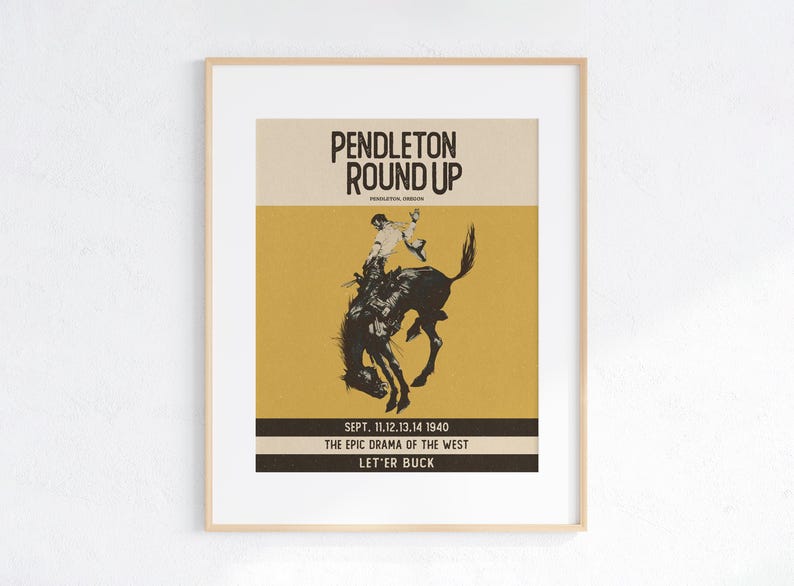 May include: Framed vintage poster for the Pendleton Round Up rodeo event. The poster features a silhouette of a cowboy riding a bucking bronco against a mustard yellow background. Text includes "PENDLETON ROUND UP" and event details.