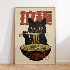 May include: A black cat with big eyes is eating ramen noodles with chopsticks. The poster has the Japanese text "Ramen no neko" which translates to "Ramen cat".