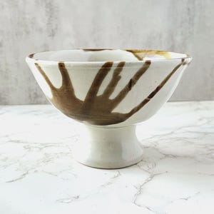 Handmade Pottery Pedestal Bowl: Earthy Drip Glaze Ceramic Centerpiece