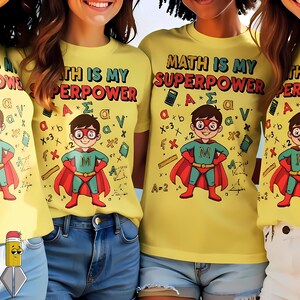 May include: Yellow t-shirts with the slogan "MATH IS MY SUPERPOWER" and a cartoon superhero design. The superhero has a red cape, green suit, and glasses. The shirts also feature math symbols.