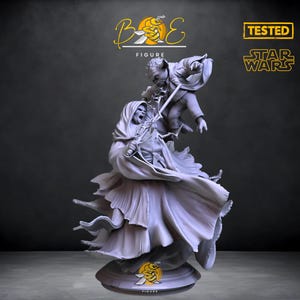 May include: A grey 3D printed Star Wars figure of Yoda fighting a Sith Lord. The figure is on a black base with a yellow bee logo. The text "TESTED" and "STAR WARS" is in the top right corner of the image.