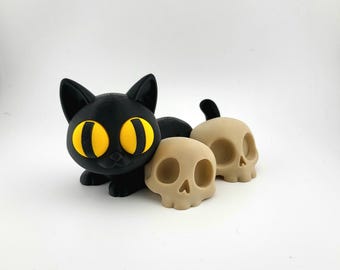 3Dプリントの猫の置物「黒猫と頭蓋骨：ゴシックハロウィンデコレーション」