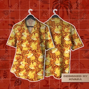May include: Two short-sleeved button-down shirts with a repeating pattern of yellow cartoon foxes and floral elements on a dark red background. The shirts are hanging on black hangers. The text "DESIGNED BY KIVARA" is visible.