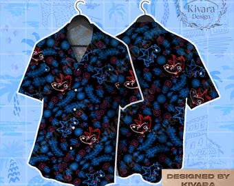 May include: Black short-sleeved button-down shirt with a vibrant pattern of blue and red cartoon dragons and floral elements. The shirt is displayed on a hanger, showcasing both the front and back designs. The text "DESIGNED BY KIVARA" is visible.