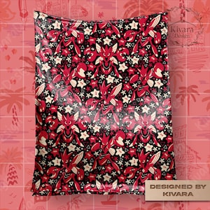 May include: A rectangular blanket featuring a repeating pattern of red insect-like creatures with large claws, interspersed with small white five-petaled flowers and tiny black triangles on a black background. The text Kivara Design is visible.