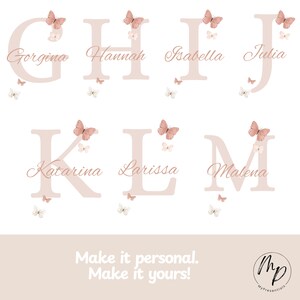 May include: A collection of personalized letter designs, each featuring a name in elegant script. The letters are adorned with butterfly illustrations in shades of pink and white, creating a delicate and feminine aesthetic. The text "Make it personal. Make it yours!" is also included.