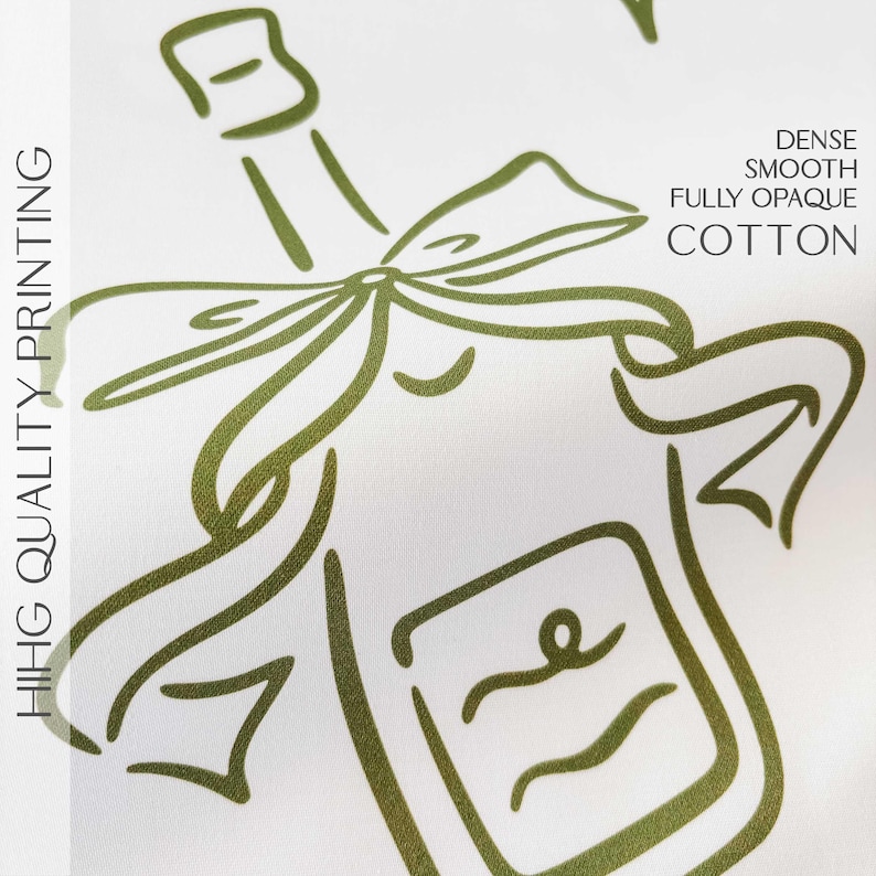 May include: A white background featuring a green outline of a champagne bottle with a bow. The text "HIHG QUALITY PRINTING" is on the left. The text "DENSE SMOOTH FULLY OPAQUE COTTON" is on the right.