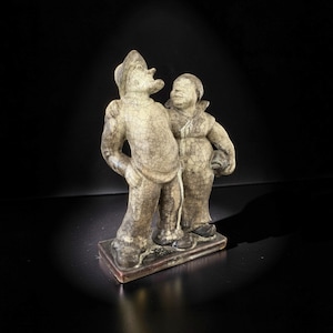 Designed by Michael Andersen for Bornholm Denmark - glazed earthenware sculpture of a fisherman and his wife.
