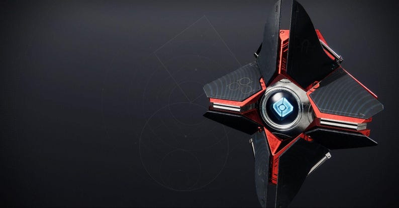 May include: A futuristic, star-shaped device with a black and red color scheme. The device has a central, circular component with a glowing blue design. The overall design suggests a high-tech or science fiction theme.