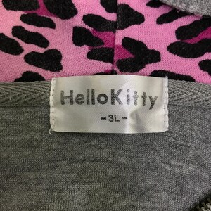 May include: A gray zip-up hoodie with a pink and black leopard print hood lining. The label reads "Hello Kitty -3L-". The hoodie is made of a soft, comfortable material.