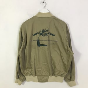 May include: A trio of ceramic mugs with a speckled, matte finish in cream, light grey, and dark grey. The mugs have a simple, minimalist design, suitable for coffee or tea.