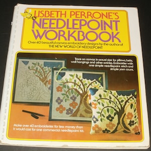 May include: A book titled "Lisbeth Perrone's Needlepoint Workbook" with a yellow cover and a picture of a needlepoint pillow with a tree design. The book includes over 40 needlepoint designs.