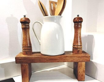 Handcrafted medium riser finished in dark oak briwax