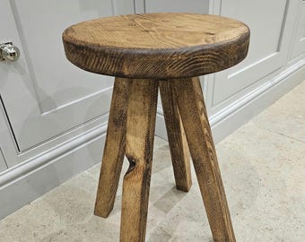 Handmade wooden round top rustic stool made from locally sourced recycled scaffold boards.