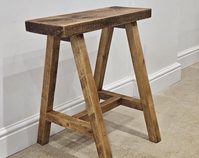 A rustic handmade recycled stool