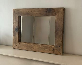 Handcrafted rustic mirror made from recycled wood and finished in a jacobean bri wax