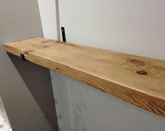 Handmade wooden shelf made from recycled scaffold board finished in a clear briwax